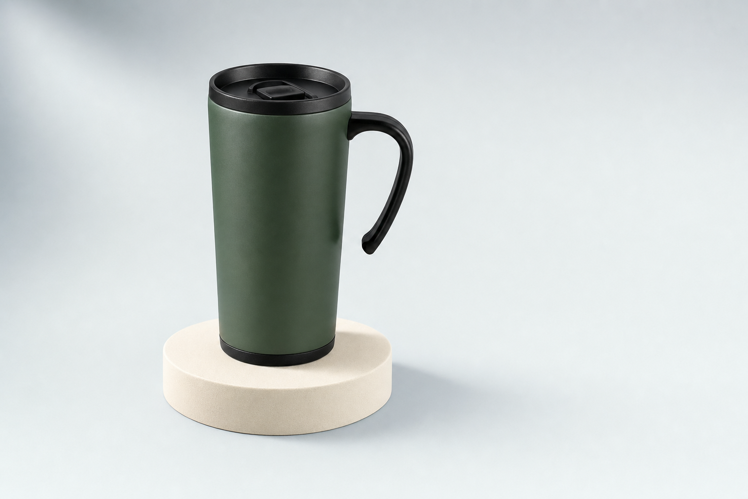 The same style of travel mug shown on a studio pedestal